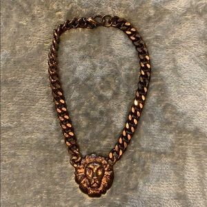 a bronze chain with lion Piece